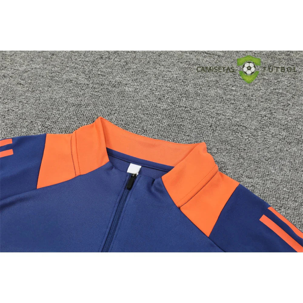 Chandal Manchester United 24-25, media cremallera, Modelo 1