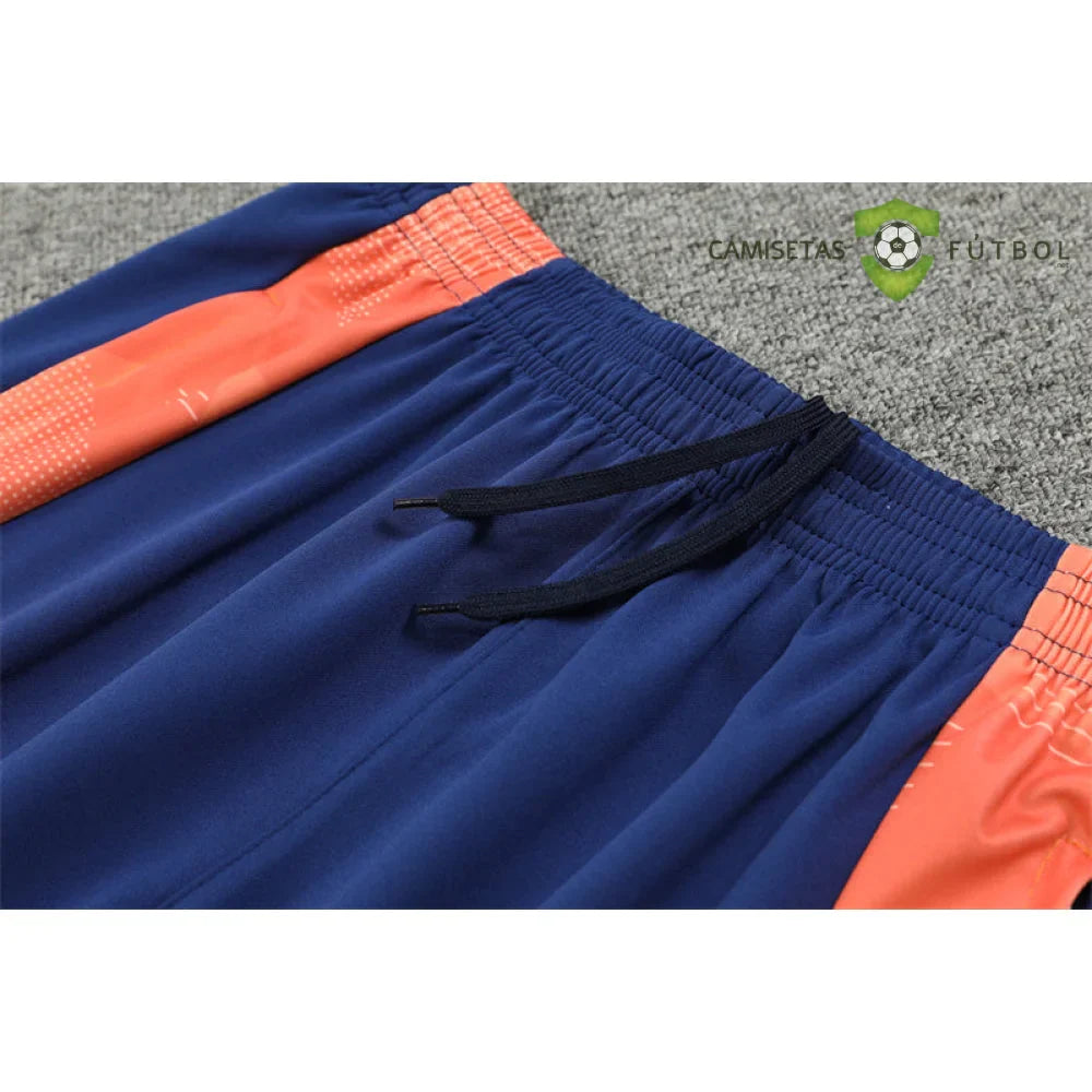 Chandal Manchester United 24-25, media cremallera, Modelo 1