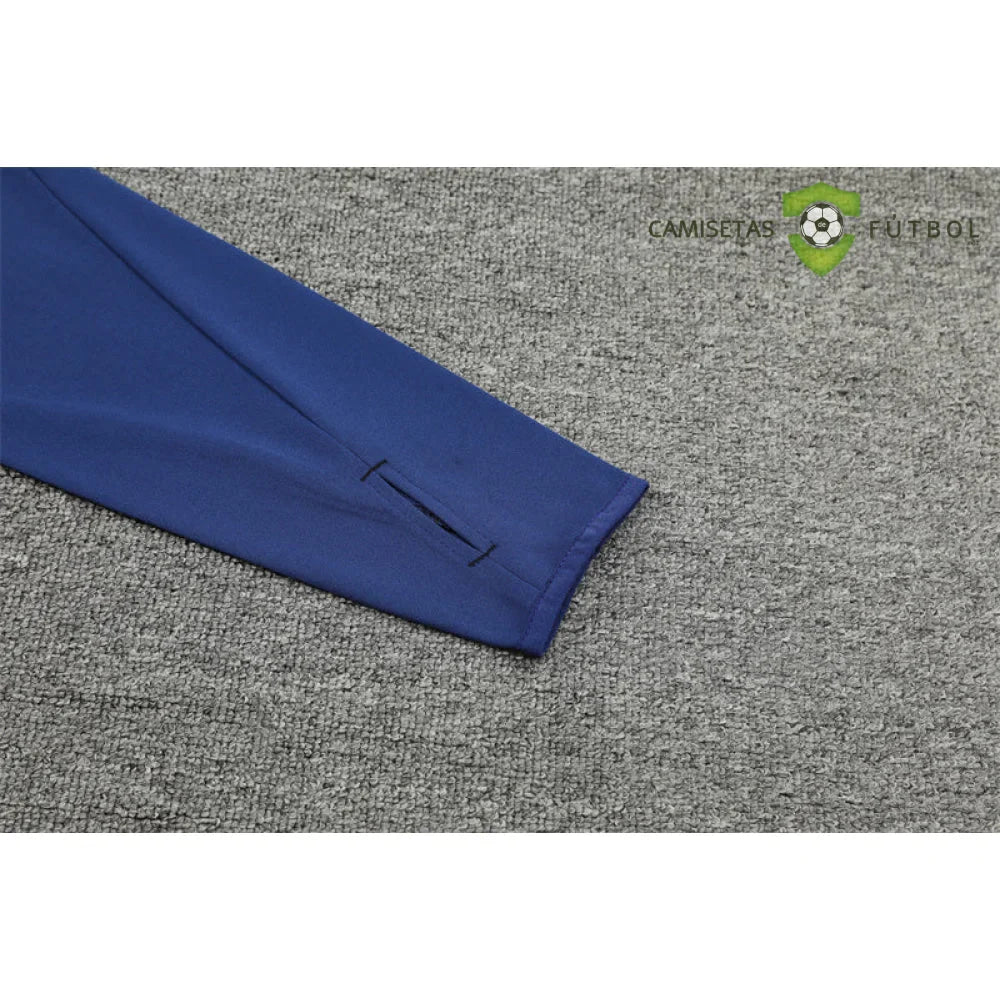Chandal Manchester United 24-25, media cremallera, Modelo 1