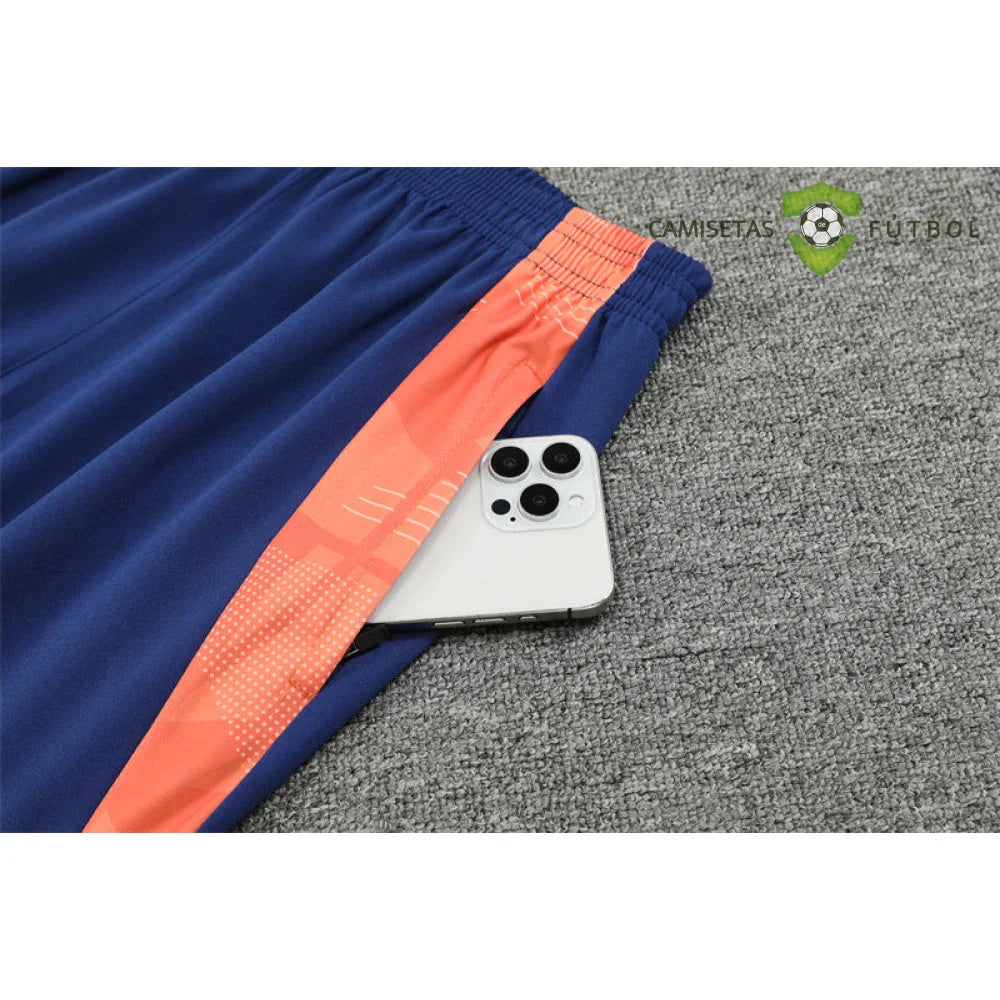 Chandal Manchester United 24-25, media cremallera, Modelo 1