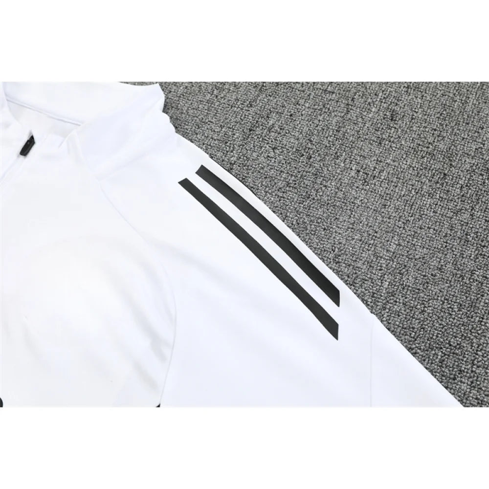 Chandal Manchester United 25-26, media cremallera, Modelo 1