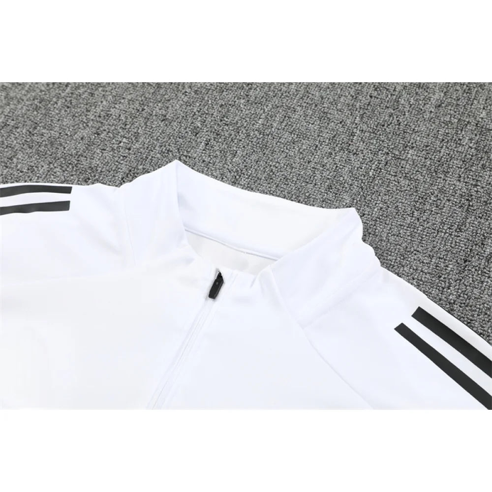 Chandal Manchester United 25-26, media cremallera, Modelo 1