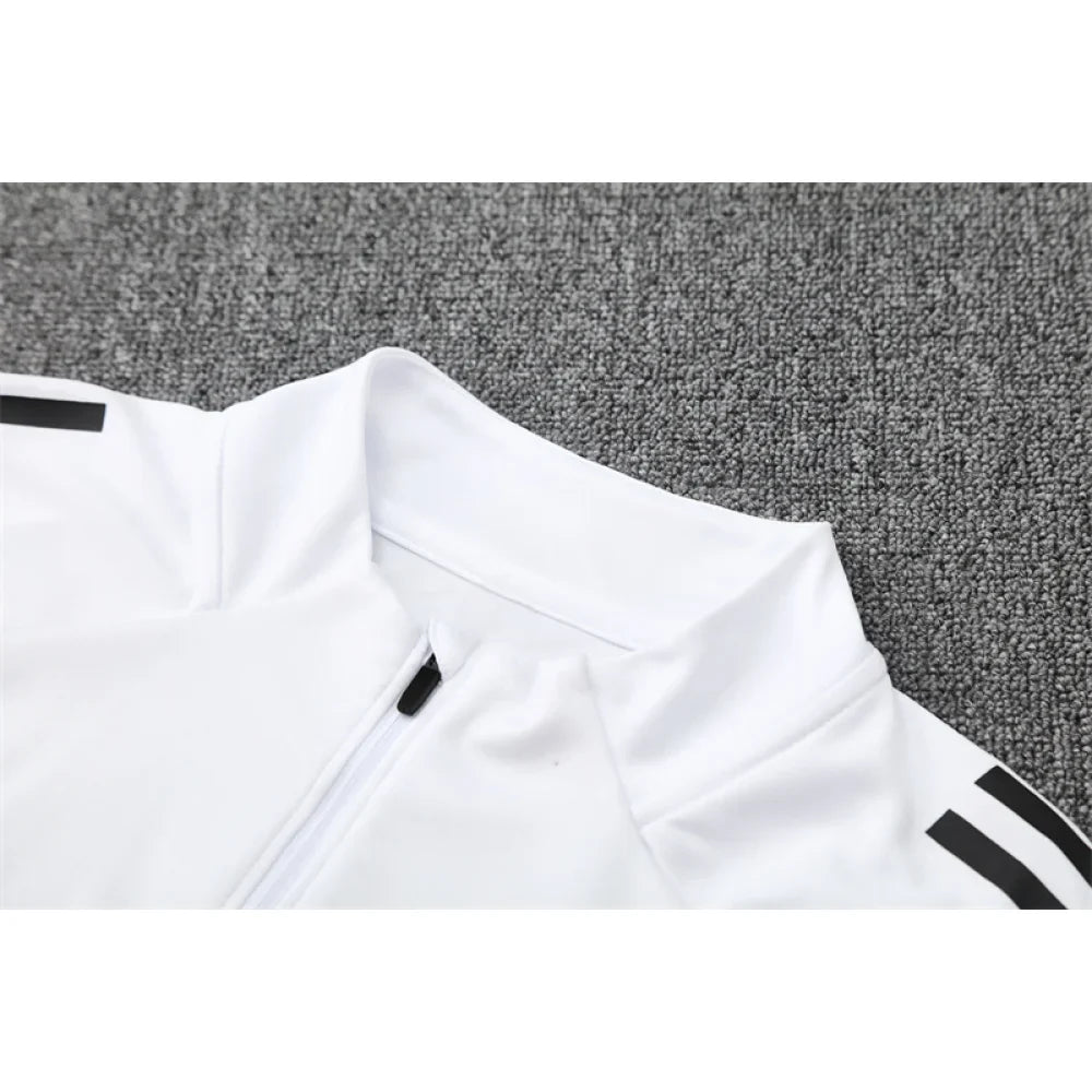 Chandal Manchester United 25-26, media cremallera, Modelo 3