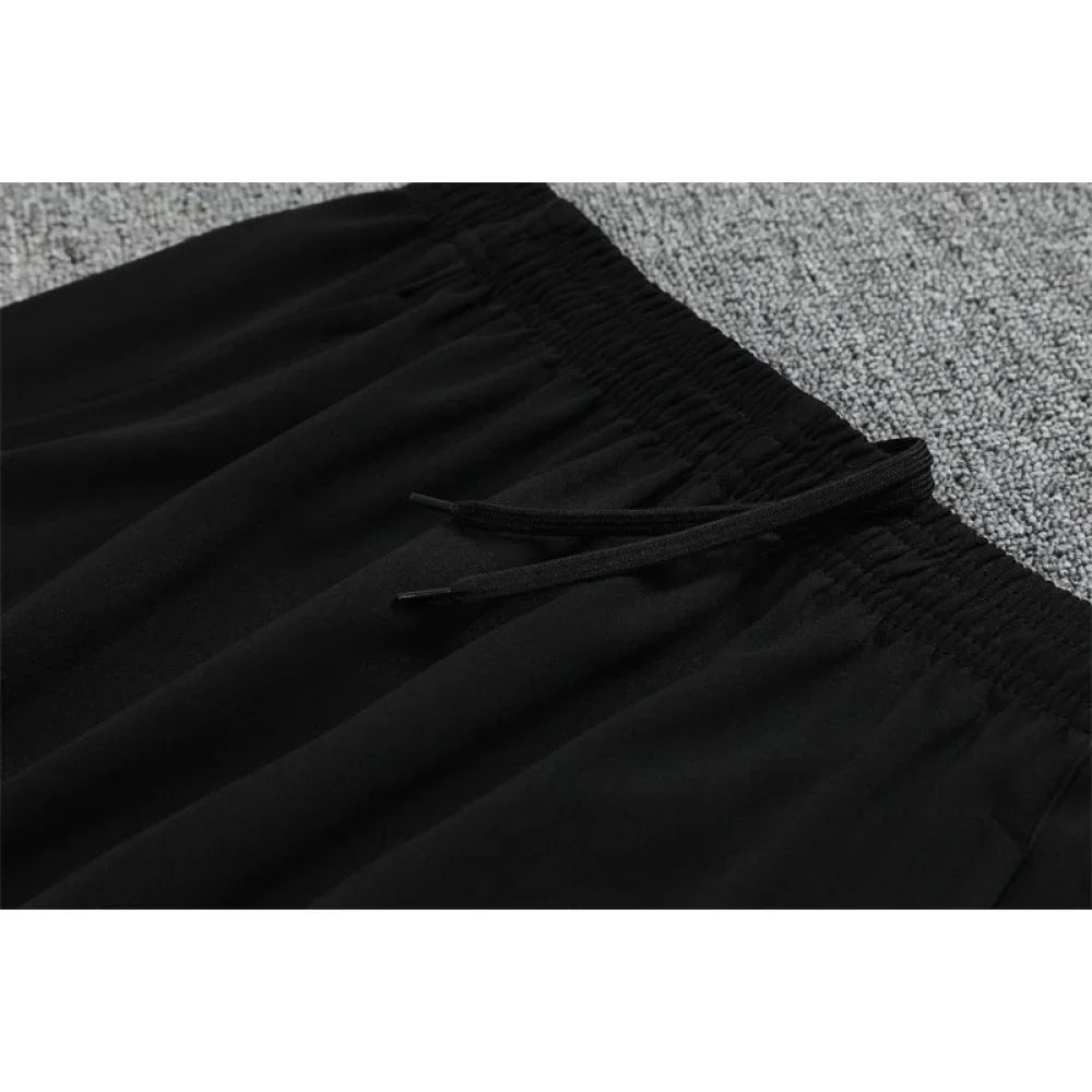 Chandal Manchester United 25-26, media cremallera, Modelo 4