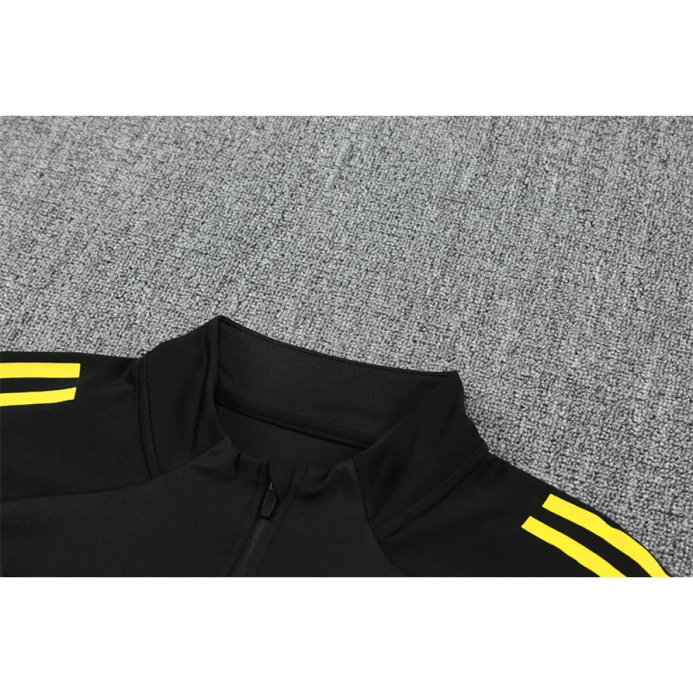Chandal Manchester United 25-26, media cremallera, Modelo 5