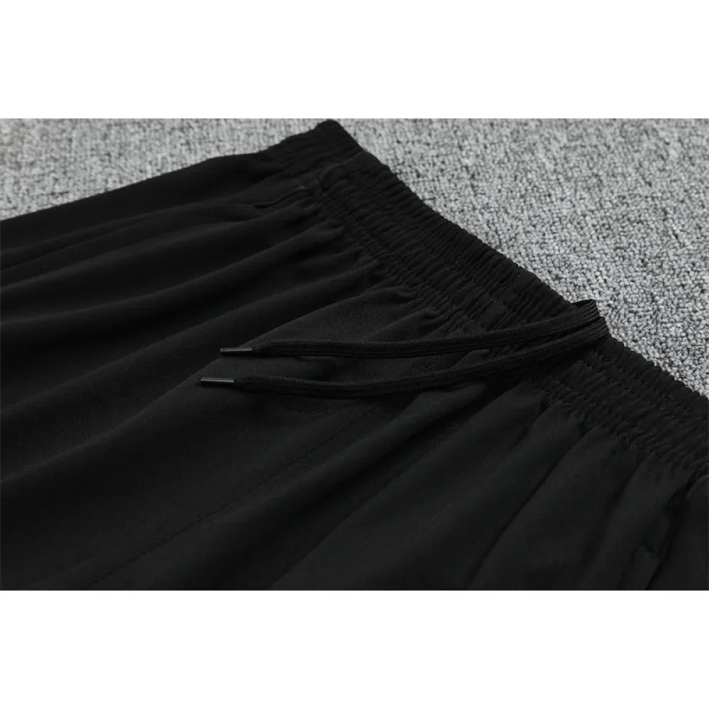 Chandal Manchester United 25-26, media cremallera, Modelo 5